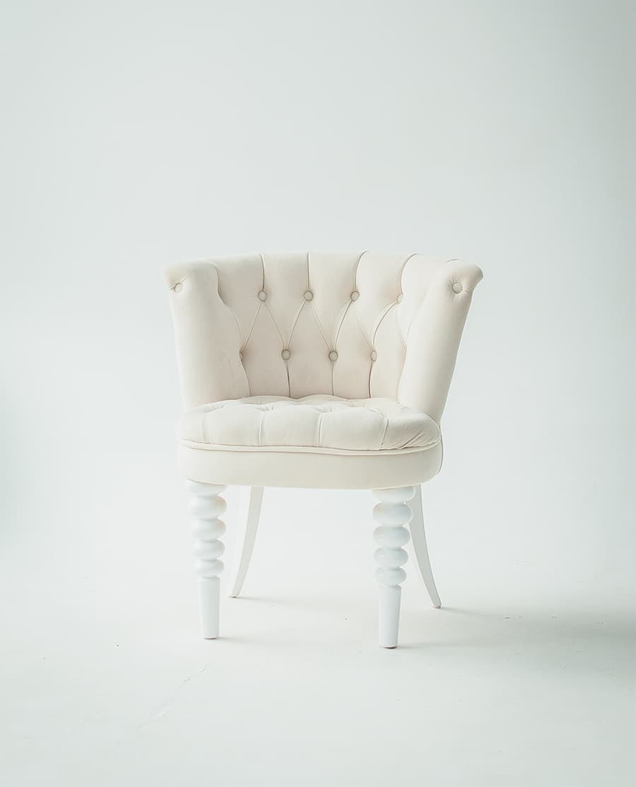 White tufted chair
